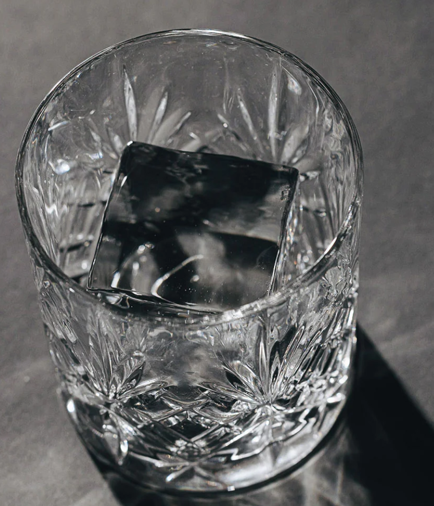 Clear cube in a crystal glass